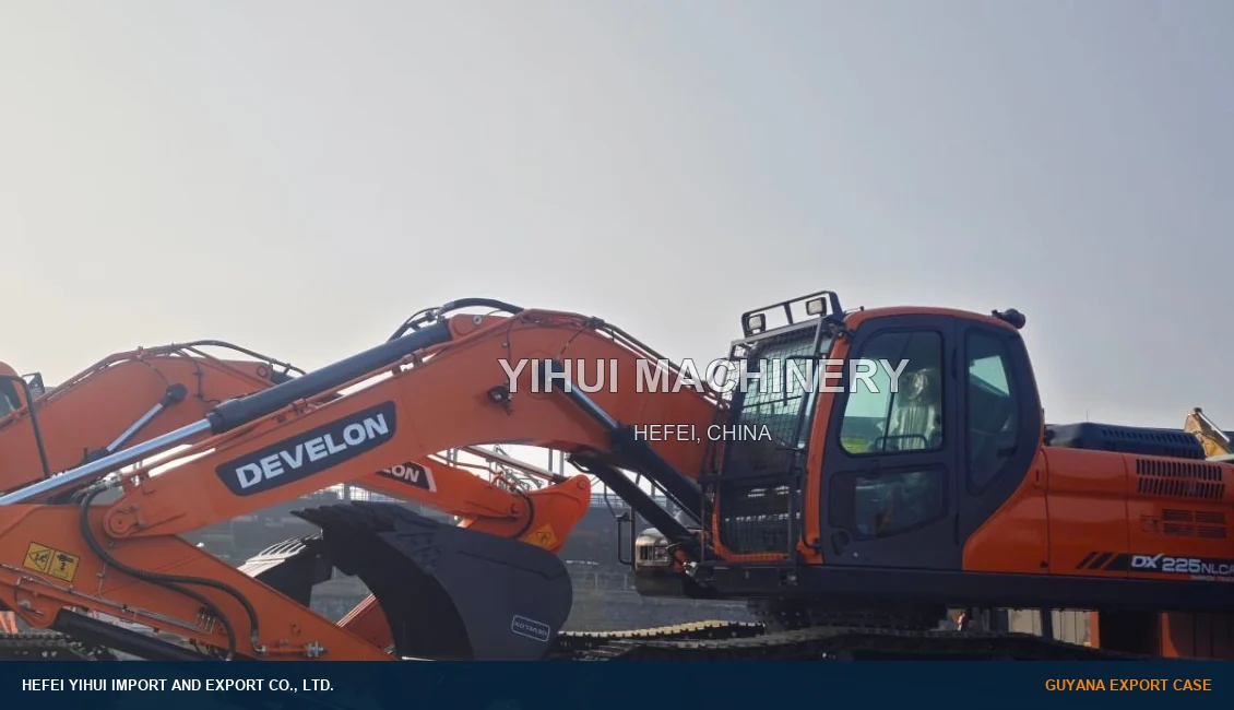 New DEVELON DX225NLCA excavator positioned during flat-rack handling for a Guyana export order