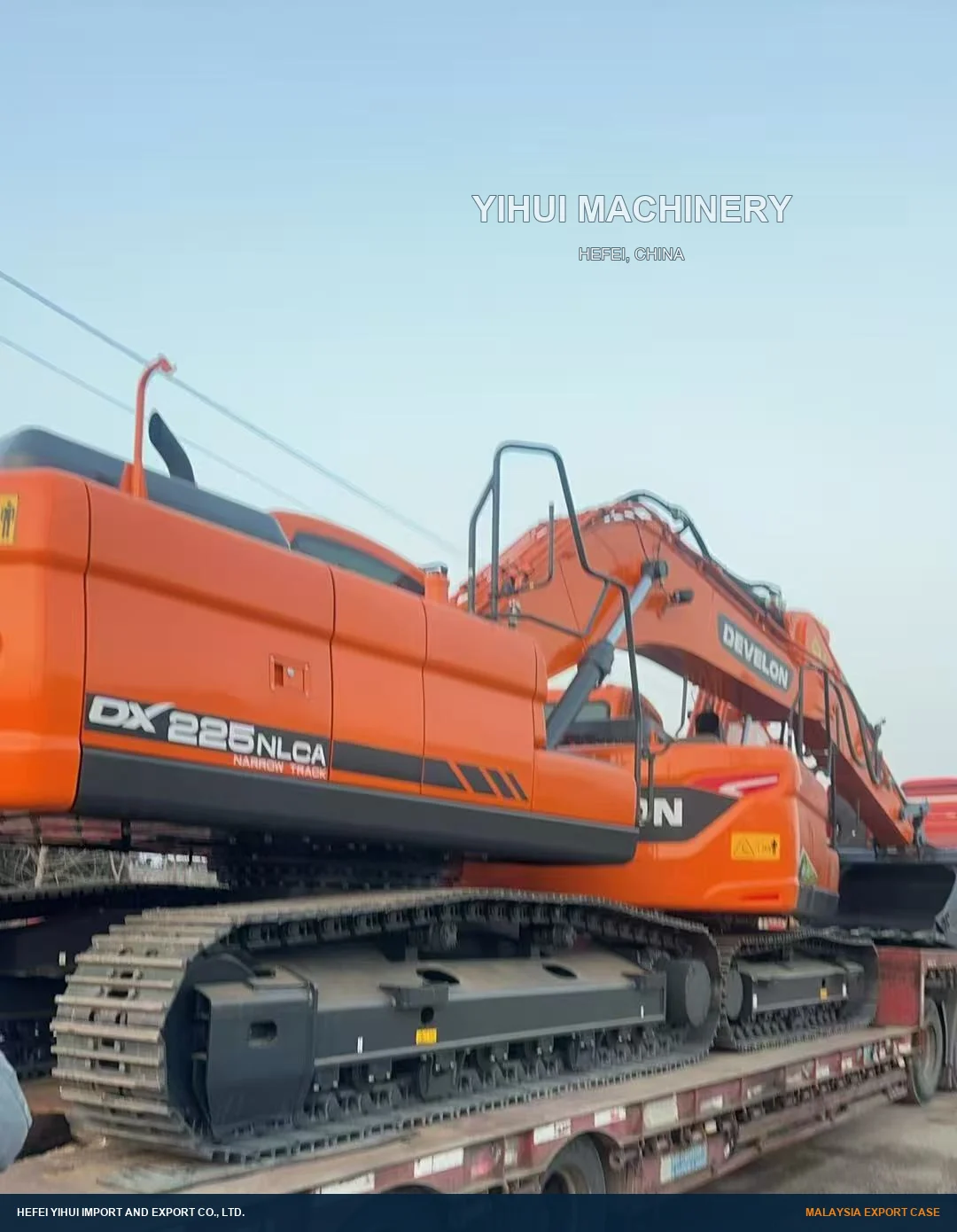 DEVELON DX225NLCA excavator on a road trailer for a Malaysia export case